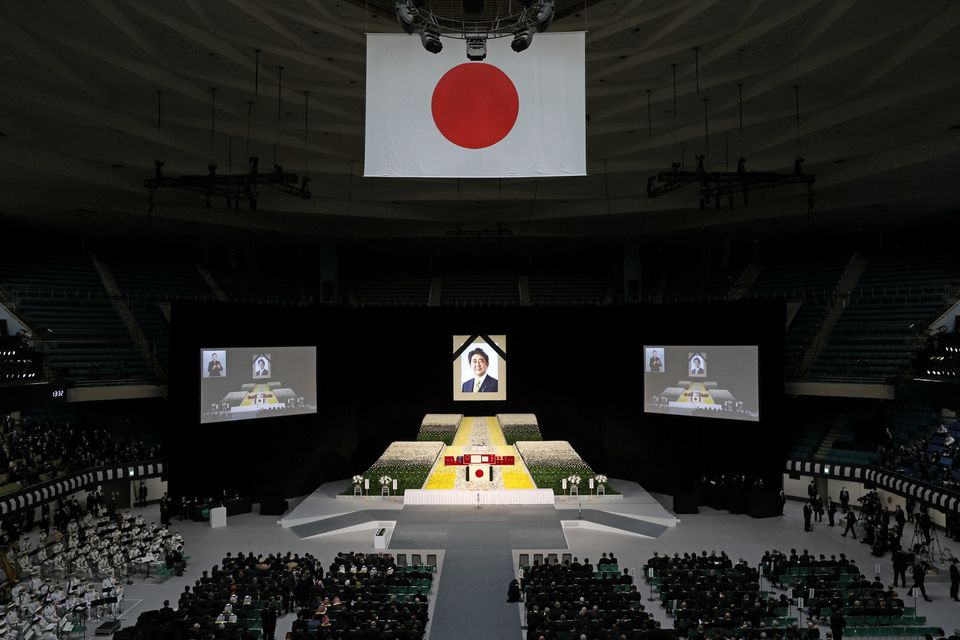 With flowers and a gun salute, Japan bids farewell to Abe at state funeral