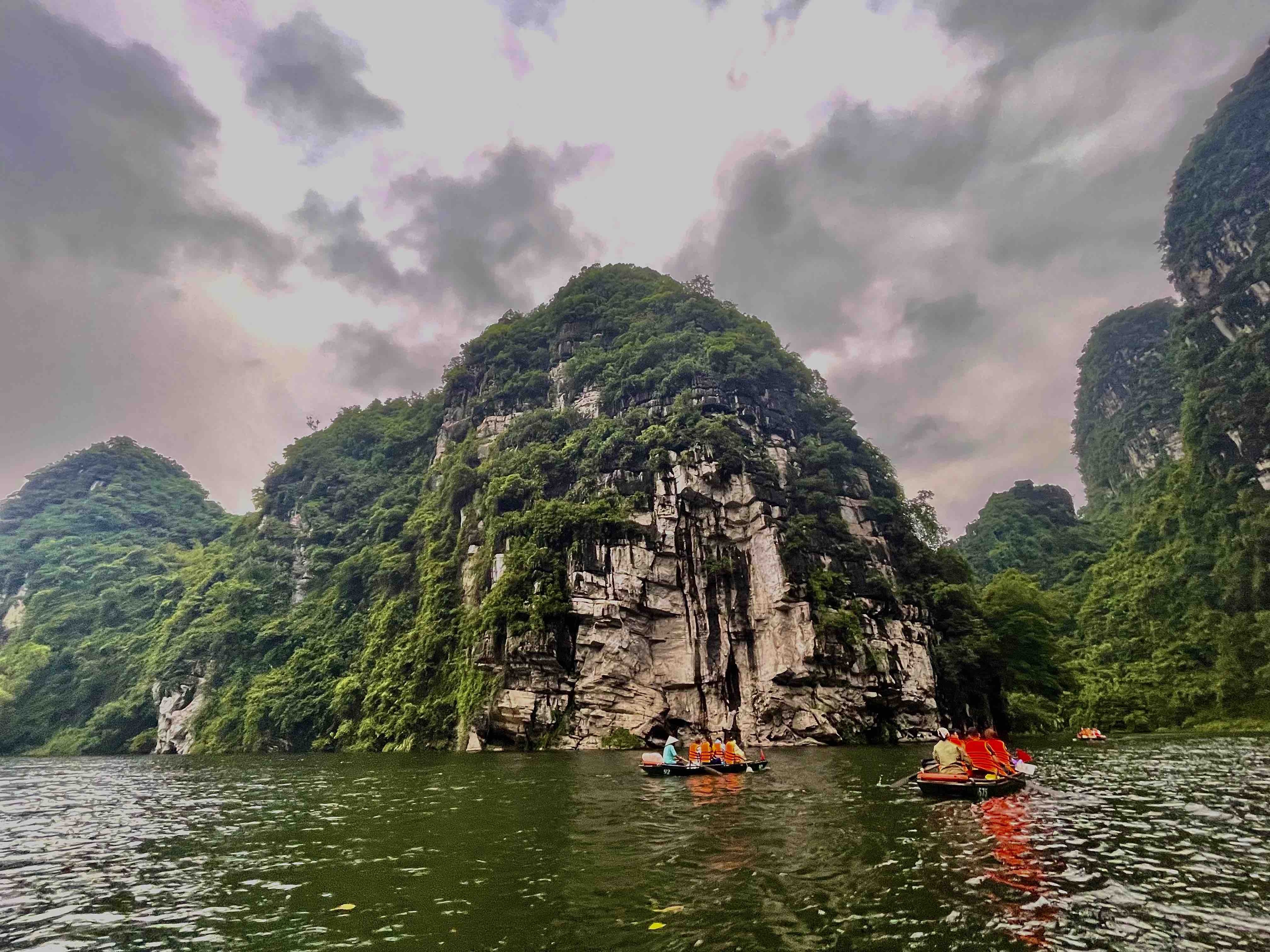 Boats carry tourists at Trang An Complex, Ninh Binh Province, Vietnam. Photo: Linh To / Tuoi Tre News