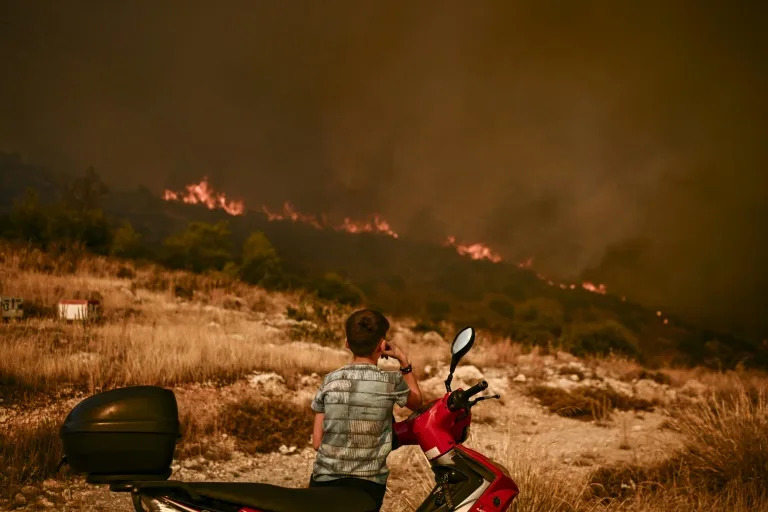 Athens district evacuated as Greek fire death toll hits 20