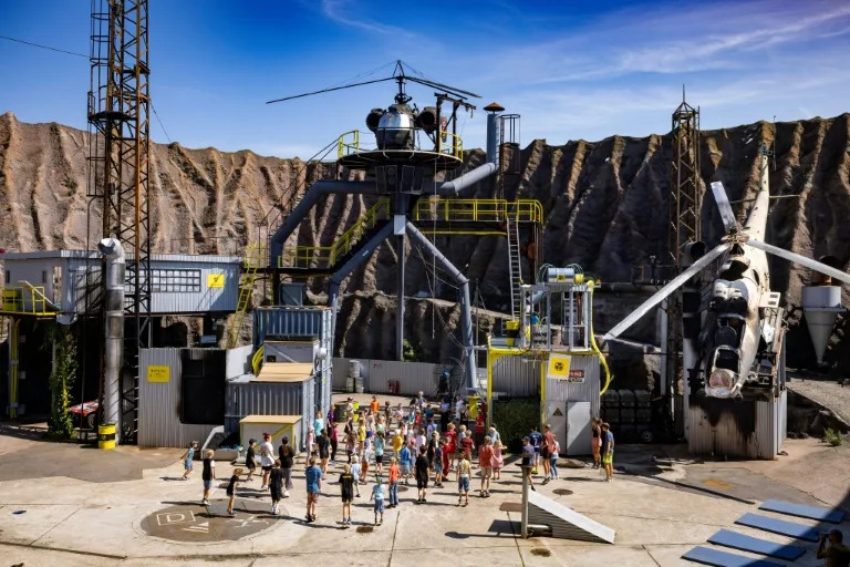 Strike-hit German stunt performers train kids during filming freeze