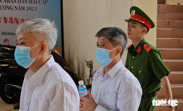 17 stand trial for allegedly issuing illegal work permits to foreigners in Vietnam