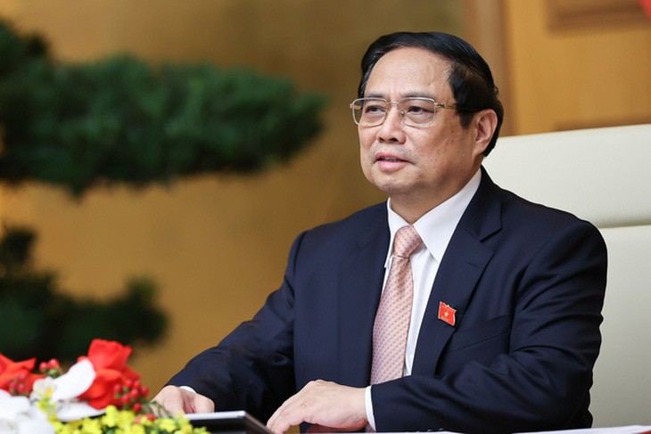 Vietnam’s Prime Minister Pham Minh Chinh speaks during his virtual talks with his Danish counterpart Mette Frederiksen at the Government Office in Hanoi on November 1, 2023. Photo: VGP