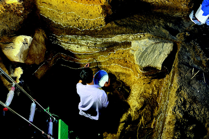 An archaeologist from the Vietnam Institute of Archaeology during an excavation in Tam Chuc Pagoda Complex in Kim Bang District of Ha Nam Province, northern Vietnam, March 2023. Photo: Vietnam Institute of Archaeology