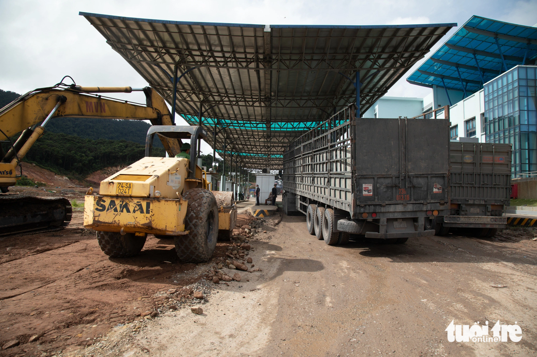 A road leading to the checkpoint is regularly repaired.