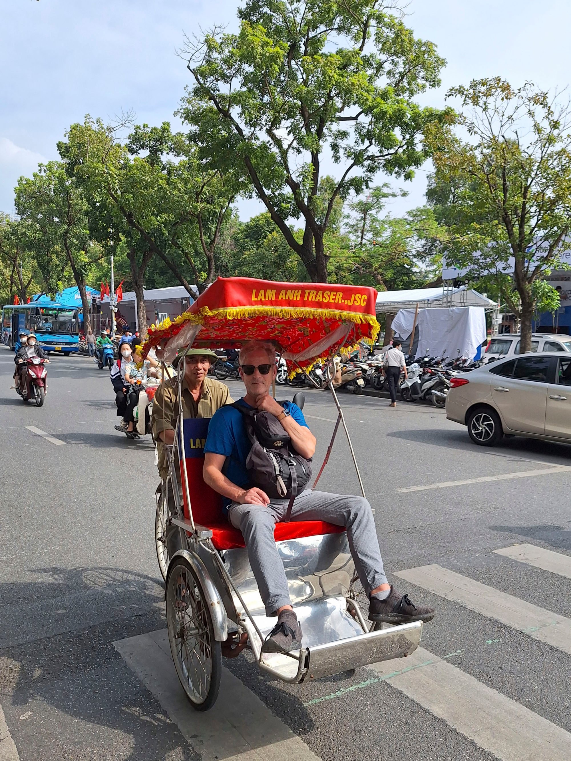 A tourist takes a ride in a cyclo. Photo: SCMP