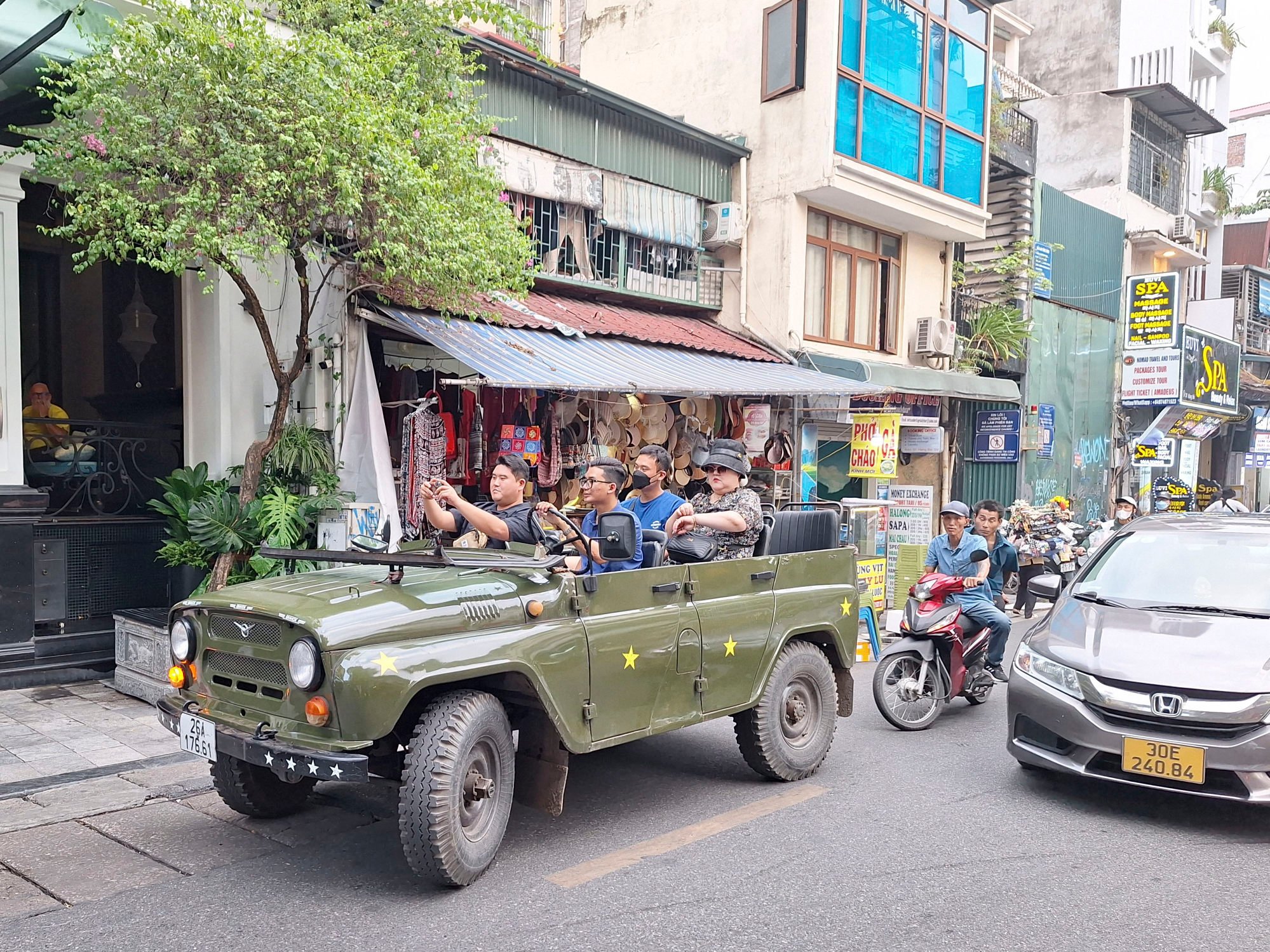 Tourists take a jeep tour in Hanoi. Photo: SCMP