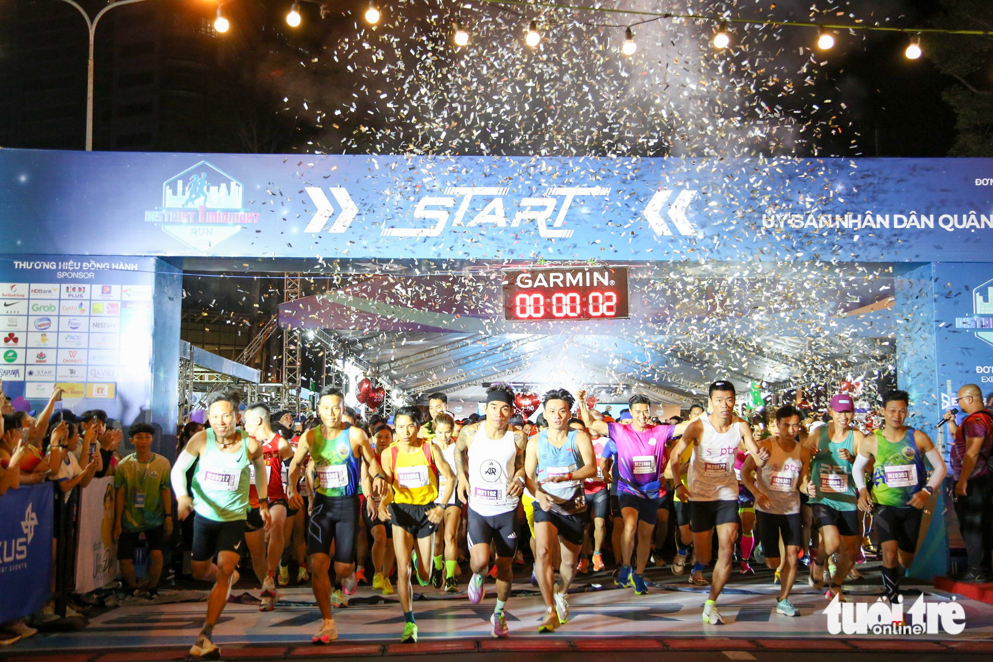 People take part in the District 1 Midnight Run 2023 in Ho Chi Minh City, March 25, 2023. Photo: Phuong Quyen / Tuoi Tre