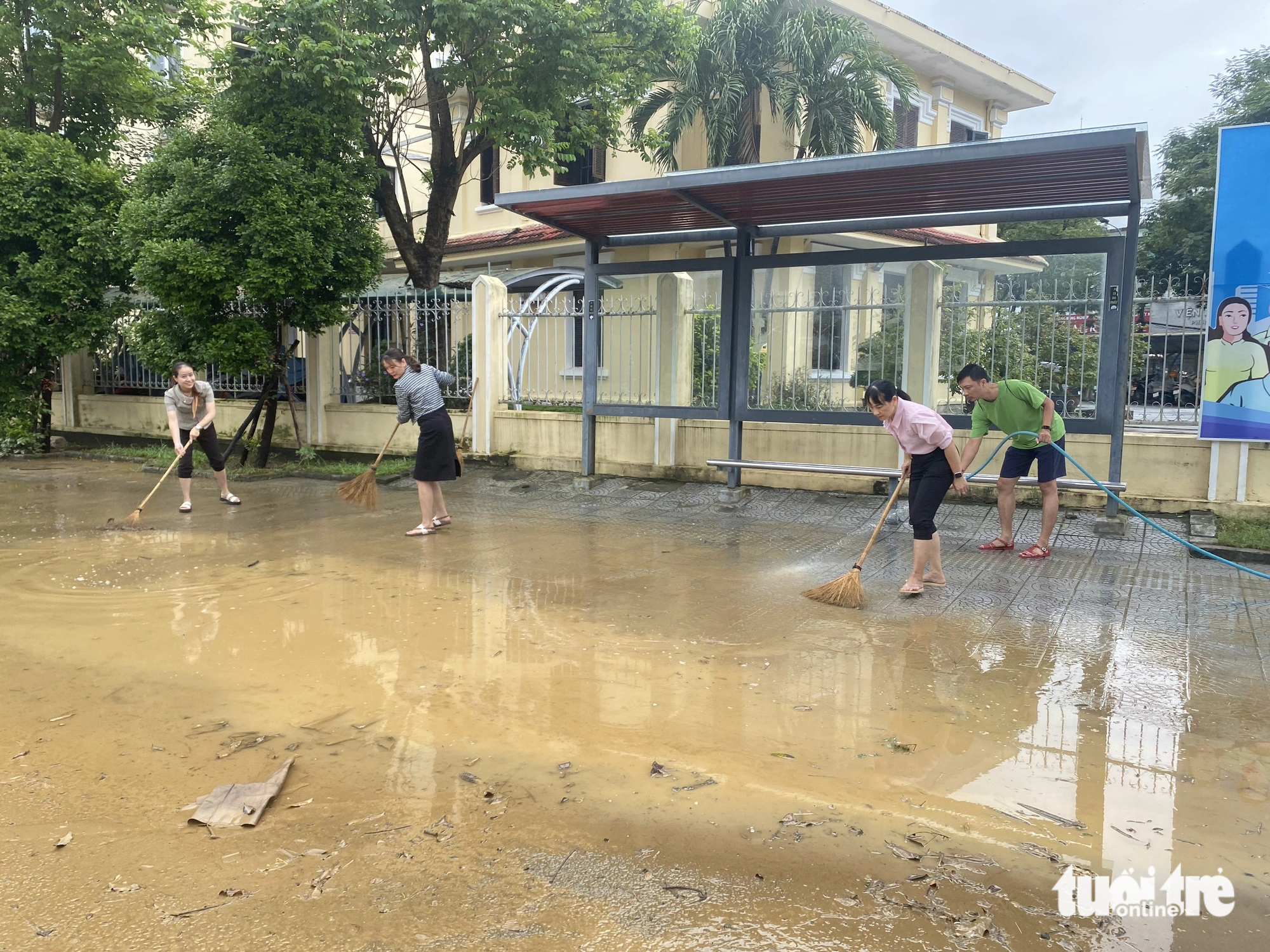 Residents clean up as floodwaters recede in Vietnam’s Hue City
