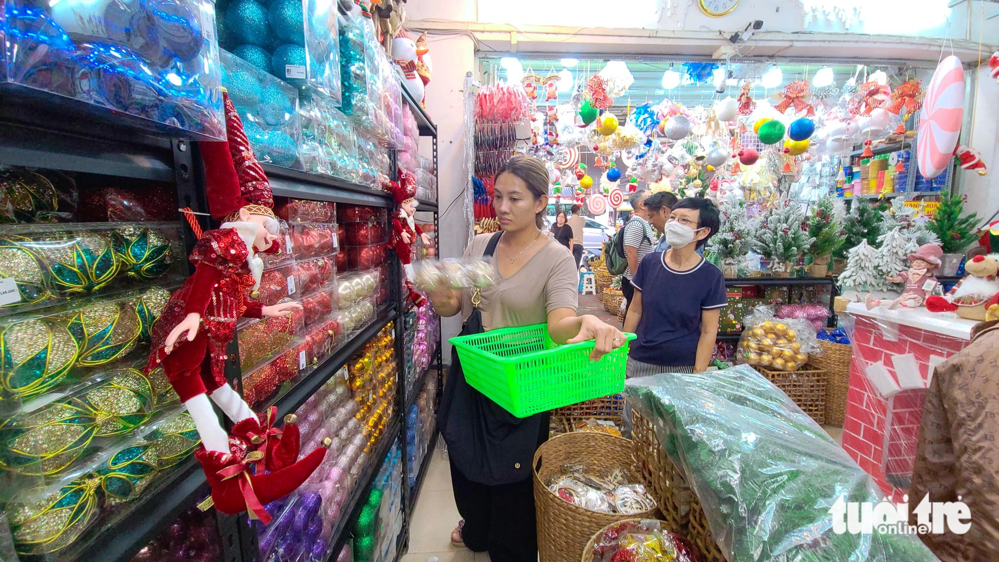 People shop for Christmas decorations at a store in Ho Chi Minh City. Photo: Nhat Xuan / Tuoi Tre