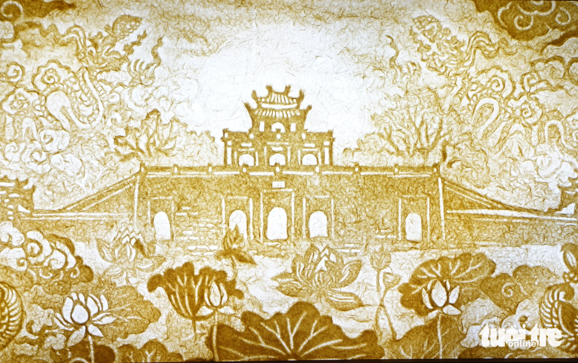 The Imperial Citadel of Thang Long is depicted on a ‘truc chi’ painting on display at 22 Hang Buom Cultural and Arts Center in Hanoi. Photo: Nguyen Hien / Tuoi Tre