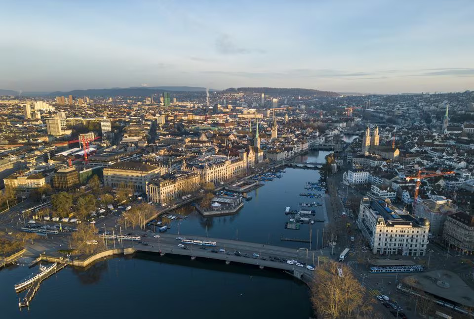 The Limmat river and the city are seen early morning in Zurich, Switzerland March 21, 2023. Photo: Reuters