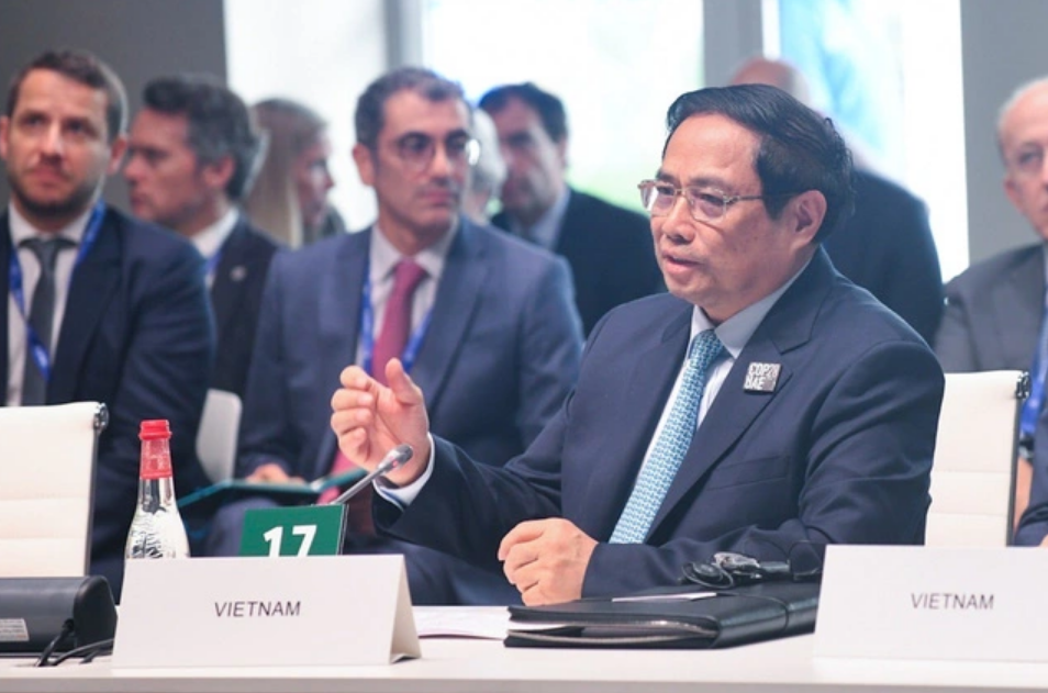 Vietnamese Prime Minister Pham Minh Chinh speaks at a seminar on clean energy transition chaired by French President Emmanuel Macron. Photo: D. Giang / Tuoi Tre
