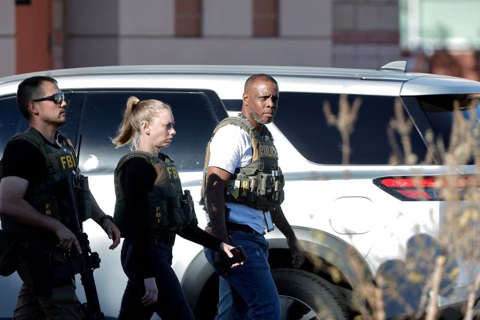 Law enforcement officers walk on UNLV campus after reports of an active shooter in Las Vegas, Nevada, U.S. December 6, 2023. Photo: Reuters