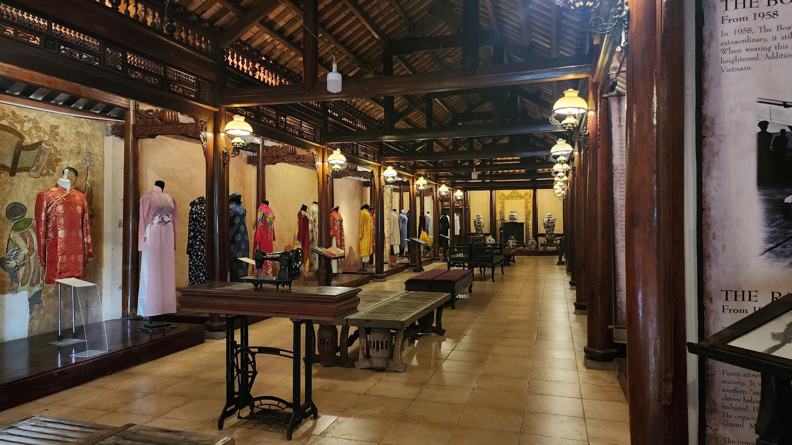 The Ao Dai History Exhibition area built from valuable wood in Quang Nam Province. Photo: Minh Chau / Tuoi Tre News