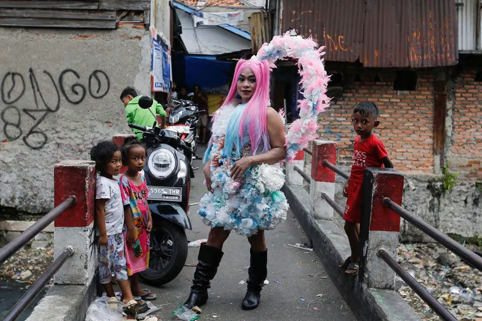 Indonesian transgender models shine spotlight on pollution with plastic fashion