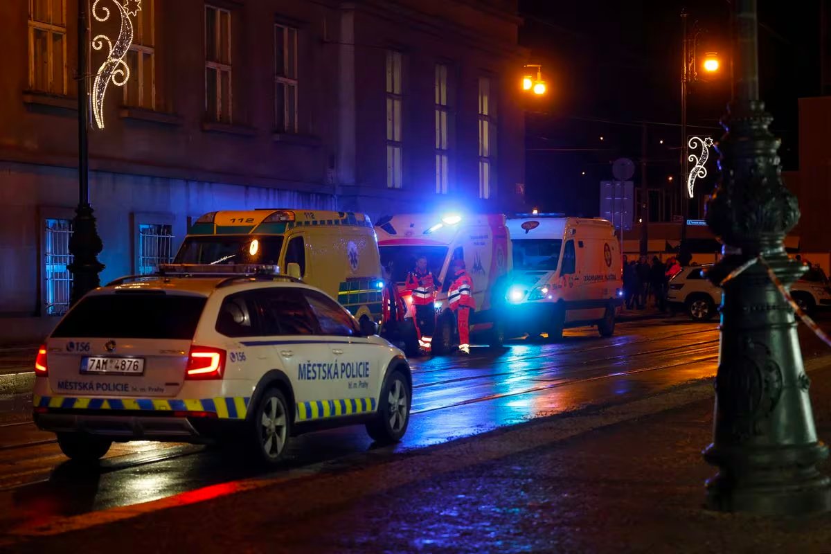 A police vehicle drives past ambulances parked near the area of the shooting at one of the buildings of Charles University in Prague, Czech Republic, December 21, 2023. Photo: Reuters