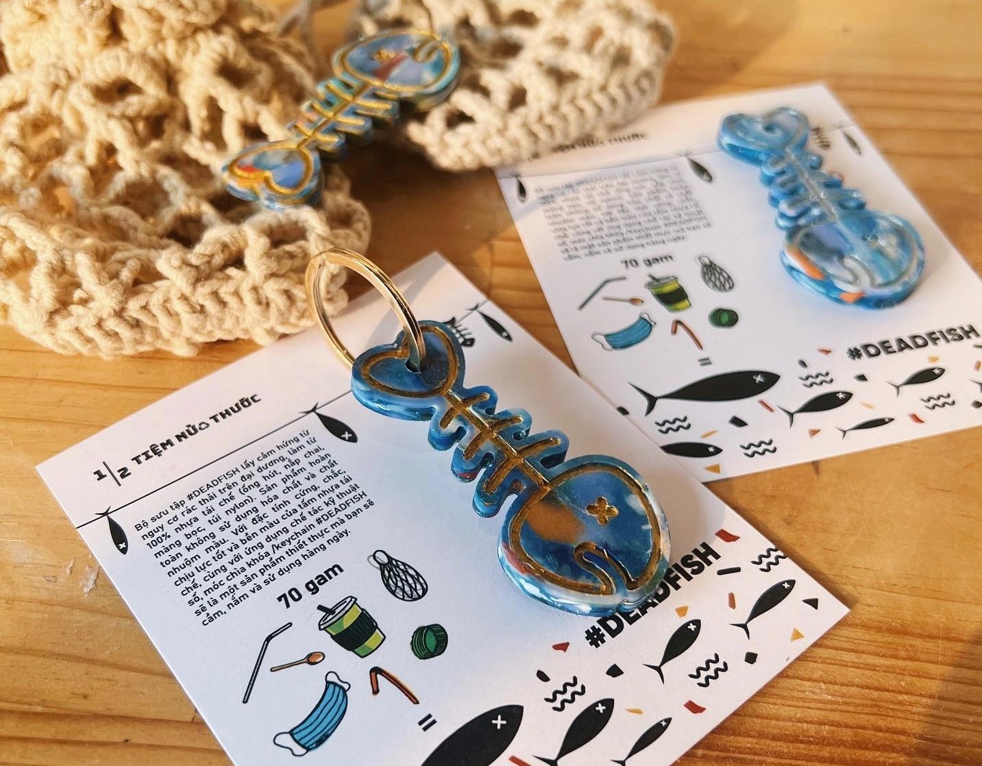 Crafted with inspiration from the risks associated with plastic waste in the ocean, these keychain models are made from recycled materials, including straws, bottle caps, wrappers, and nylon bags. Photo: Tiem Nua Thuoc