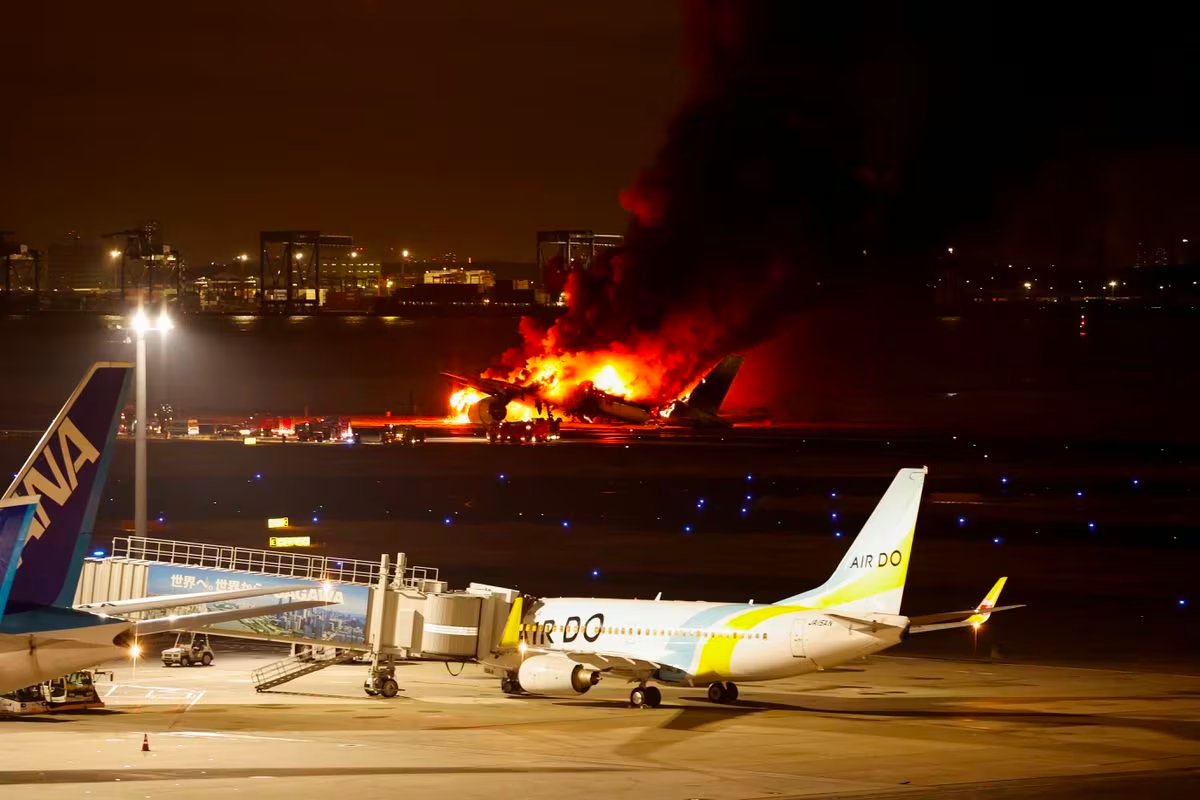 Passengers escape blaze on Japan Airlines plane after collision at Tokyo airport