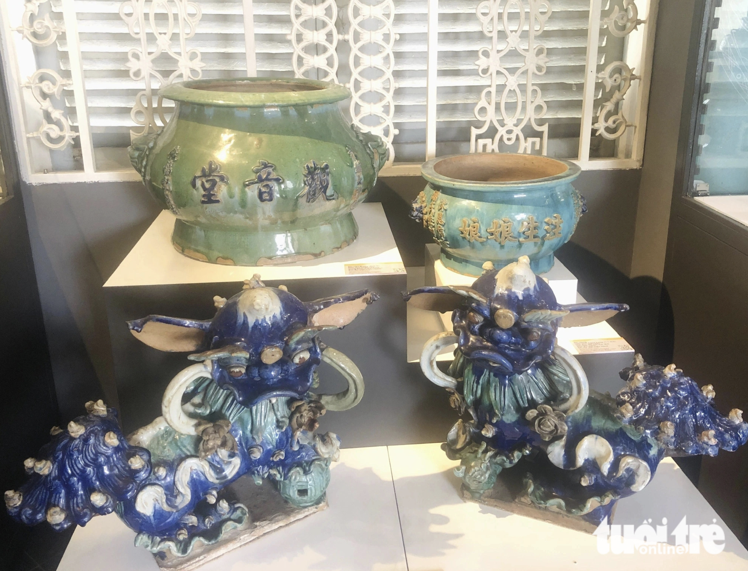 A pair of ceramic unicorns inlaid with bright enamels produced in the 20th century is being showcased at an exhibition at the Museum of Ho Chi Minh City in District 1. Photo: Hoai Phuong / Tuoi Tre