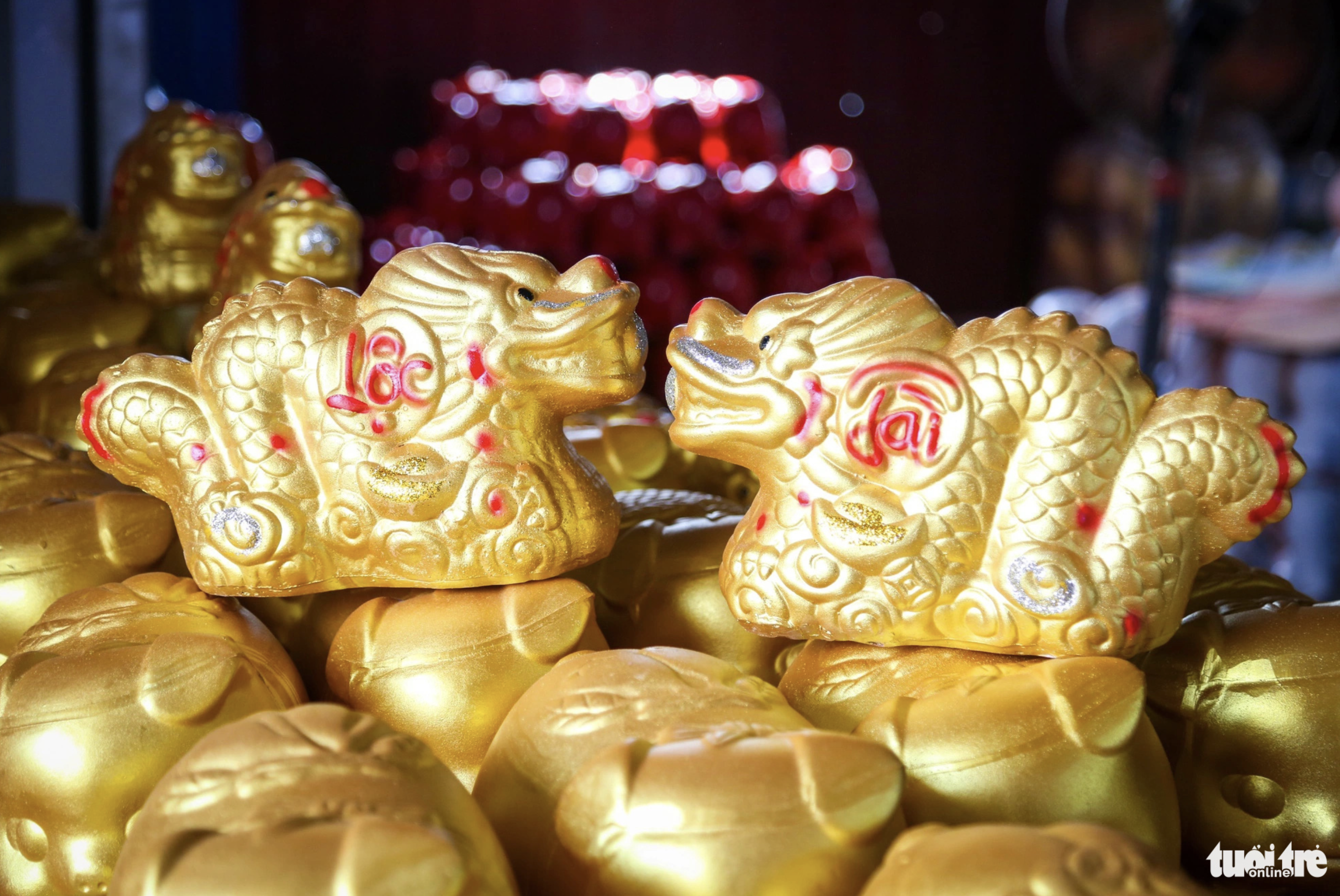 Tet vibes abound in Vietnam craft village that makes dragon piggy banks