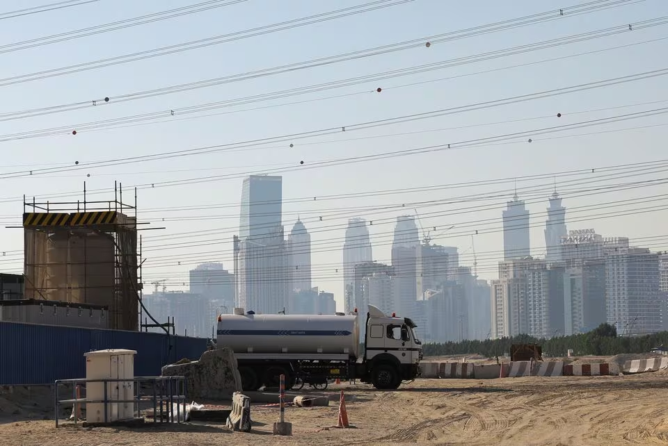 A construction site is seen, with the Dubai skyline visible in the background, in Dubai, United Arab Emirates, January 24, 2024. Photo: Reuters
