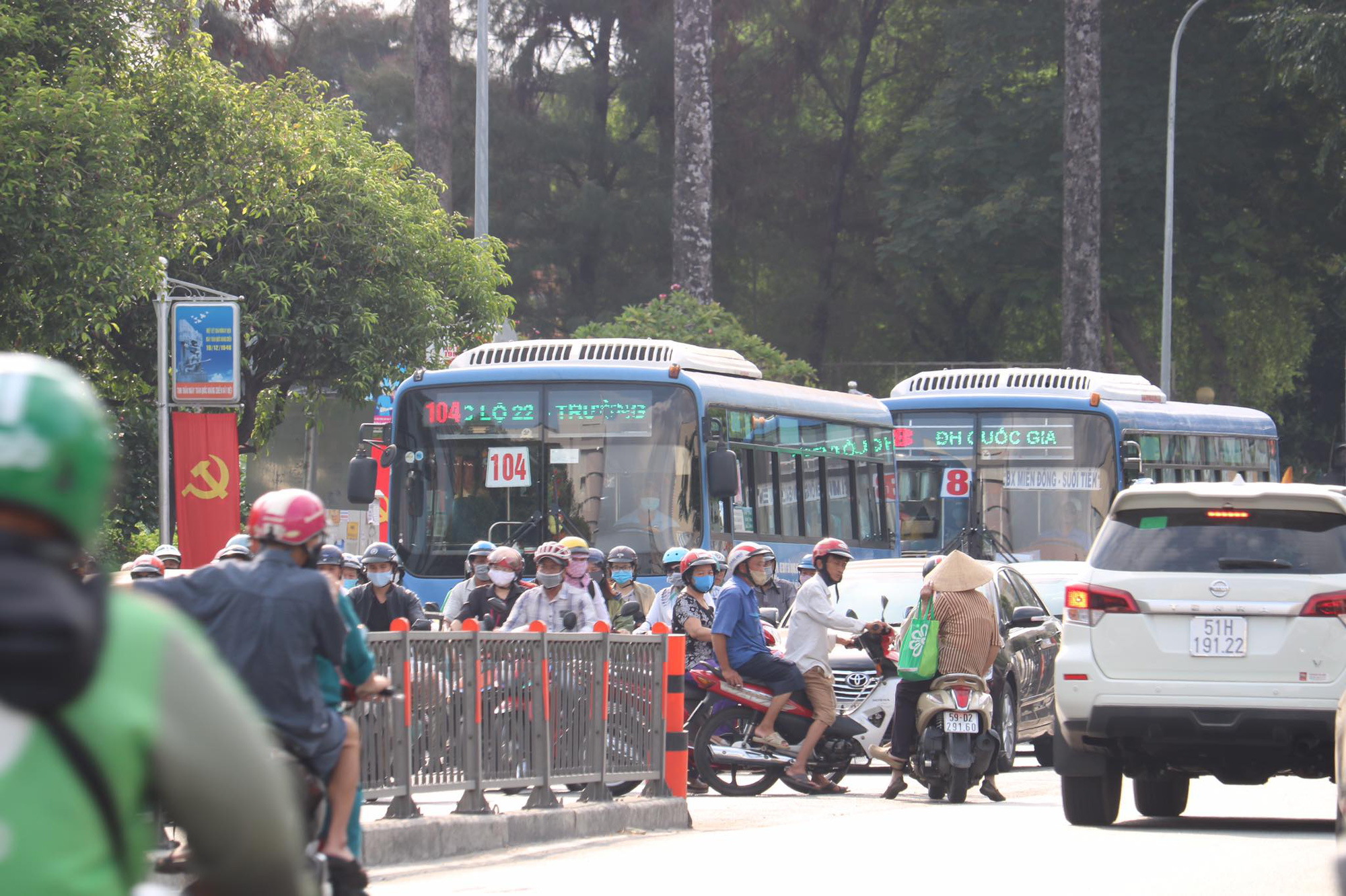 Buses are seen on a street in Ho Chi Minh City, Vietnam. Photo: Ngoc Phuong / Tuoi Tre