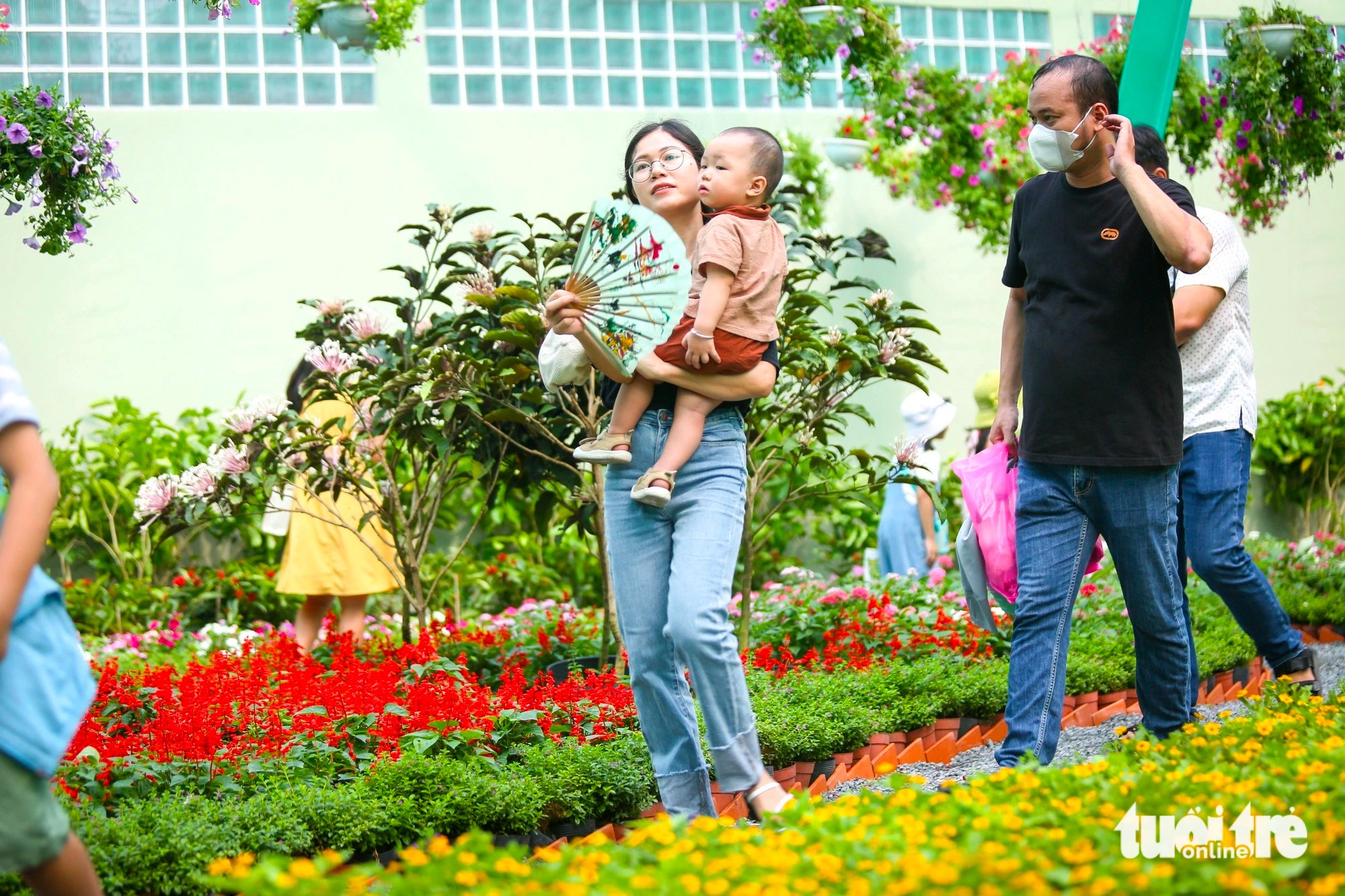 Visitors walk at the butterfly garden in the Saigon Zoo and Botanical Gardens, District 1, Ho Chi Minh City on February 6, 2024. Photo: Phuong Quyen / Tuoi Tre