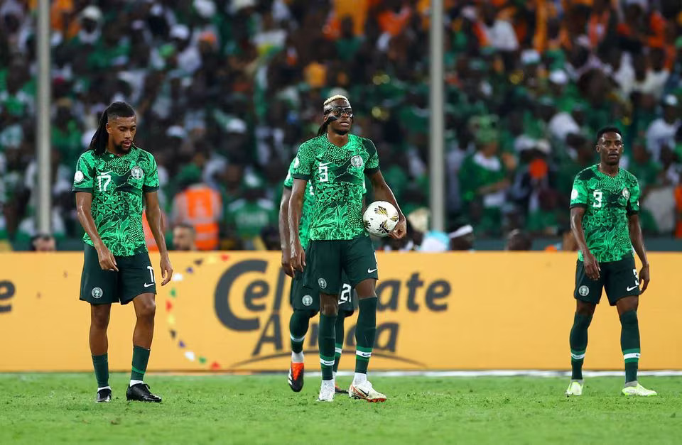 Soccer Football - Africa Cup of Nations - Final - Nigeria v Ivory Coast - Stade Olympique Alassane Ouattara, Abidjan, Ivory Coast - February 11, 2024 Nigeria's Victor Osimhen and teammates look dejected after Ivory Coast's Franck Kessie scores their first goal. Photo: Reuters