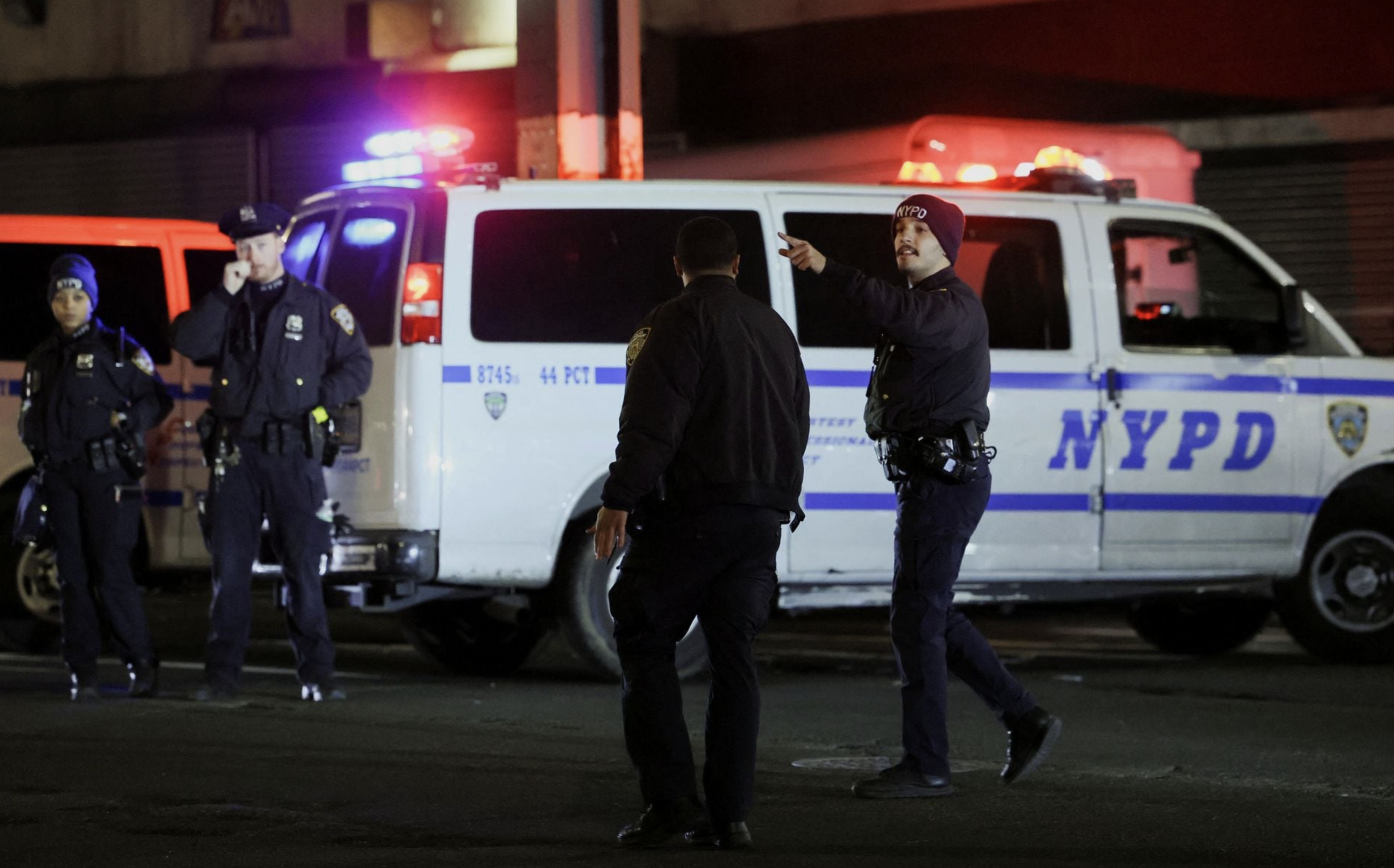 Members of the New York Police Department (NYPD) investigate the scene of a shooting at the Mount Eden subway station in the Bronx borough of New York City, U.S. February 12, 2024. Photo: Reuters