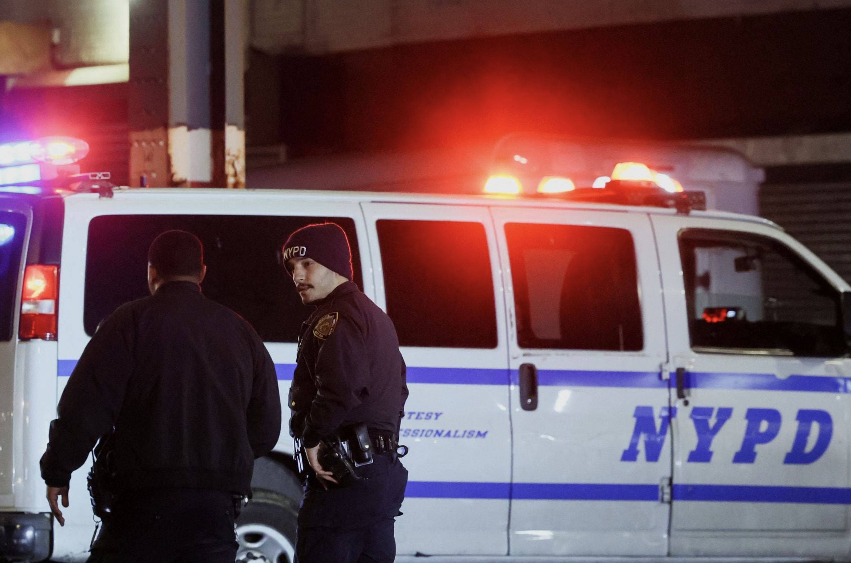 Members of the New York Police Department (NYPD) investigate the scene of a shooting at the Mount Eden subway station in the Bronx borough of New York City, U.S. February 12, 2024. Photo: Reuters