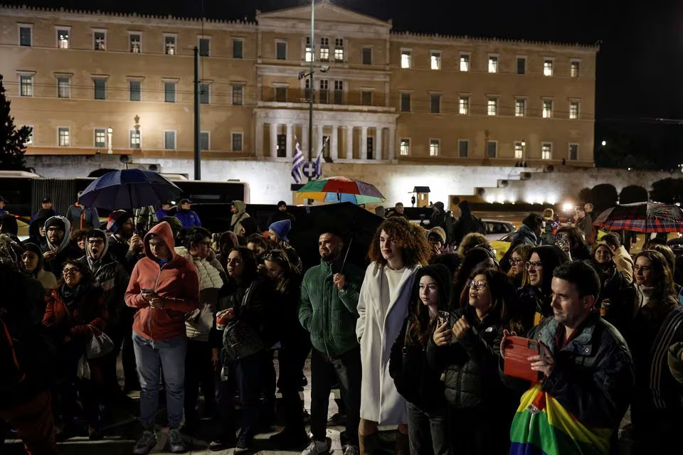 LGBTQ+ activists and supporters gather in front of the Greek parliament, ahead of the vote on the bill which legalises same-sex civil marriage, in Athens, Greece, February 15, 2024. Photo: Reuters