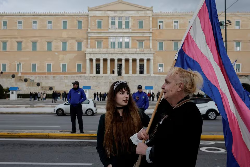 Supporters of the bill which legalises same-sex civil marriage gather in front of the Greek parliament, ahead of the vote, in Athens, Greece, February 15, 2024. Photo: Reuters