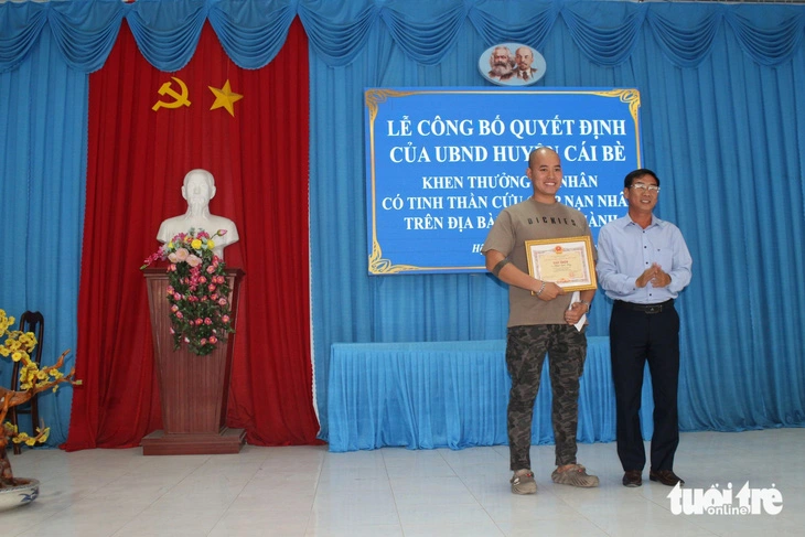 Man rewarded for rescuing boy thrown into river by drug addict in southern Vietnam