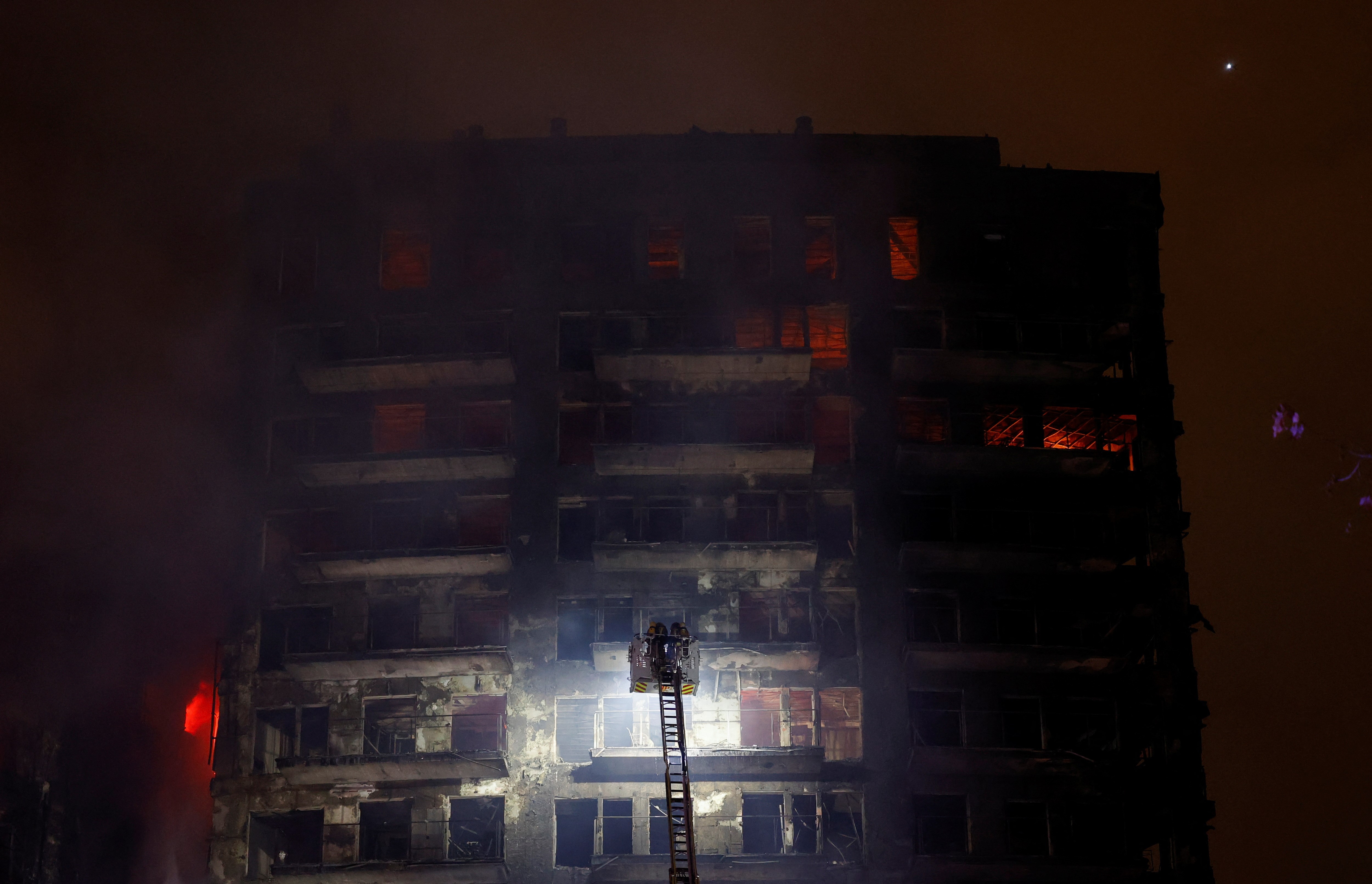 Four killed, up to 15 missing in apartment fire in Spain