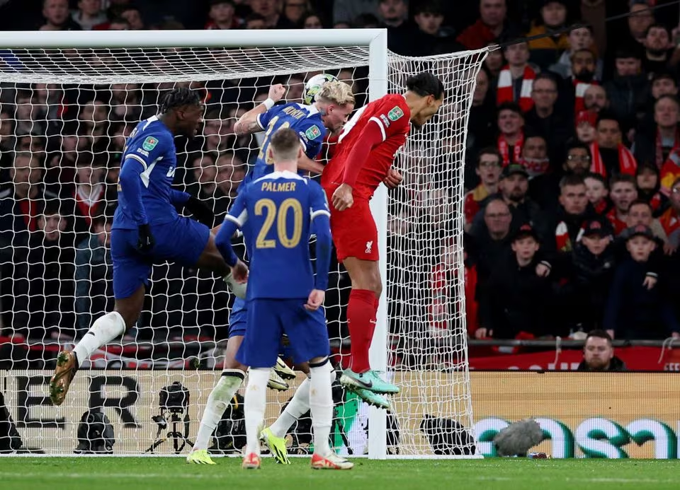 Soccer Football - Carabao Cup - Final - Chelsea v Liverpool - Wembley Stadium, London, Britain - February 25, 2024 Liverpool's Virgil van Dijk scores their first goal. Action Images via Reuters
