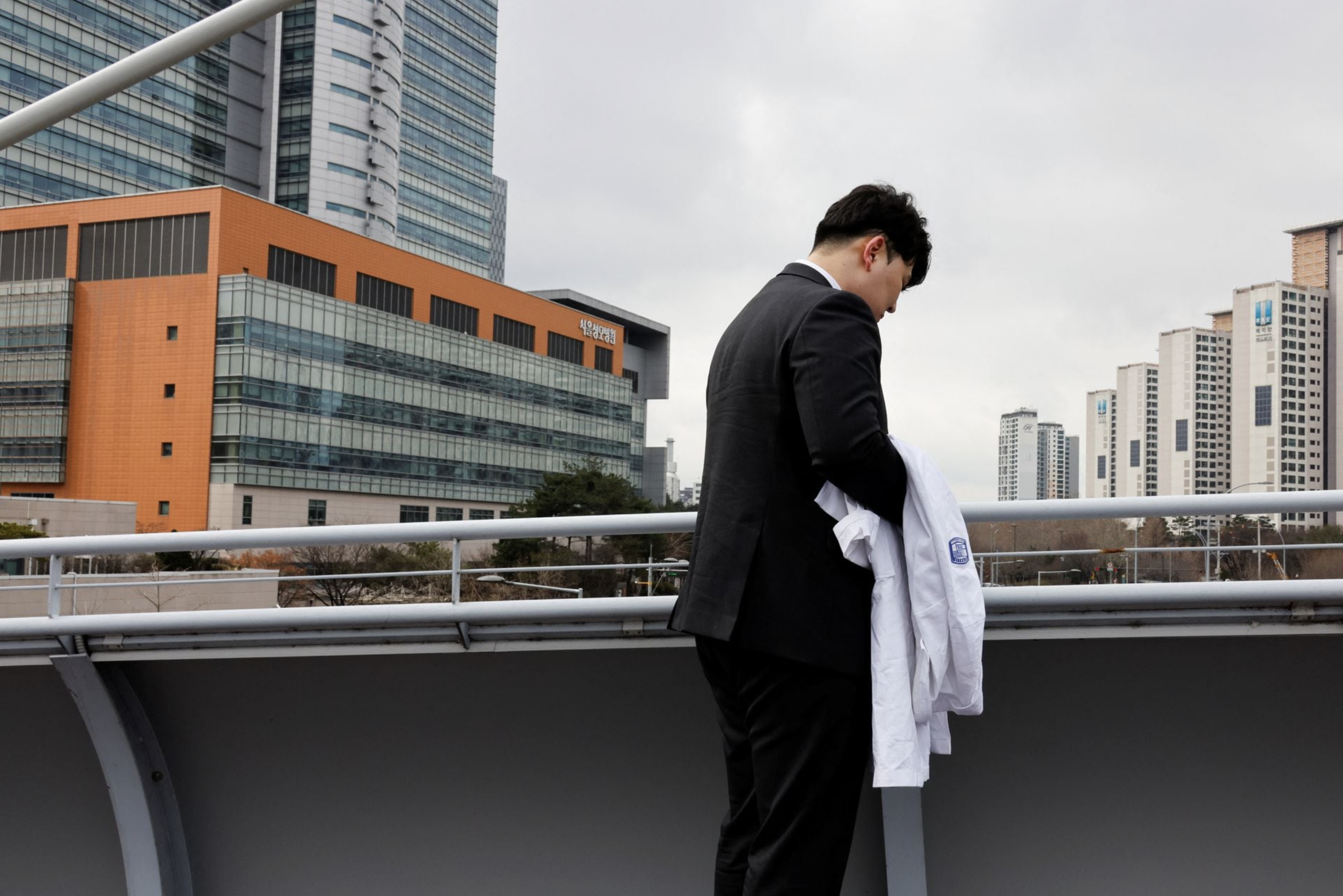 South Korea doctors on mass walkout say they are overworked and unheard