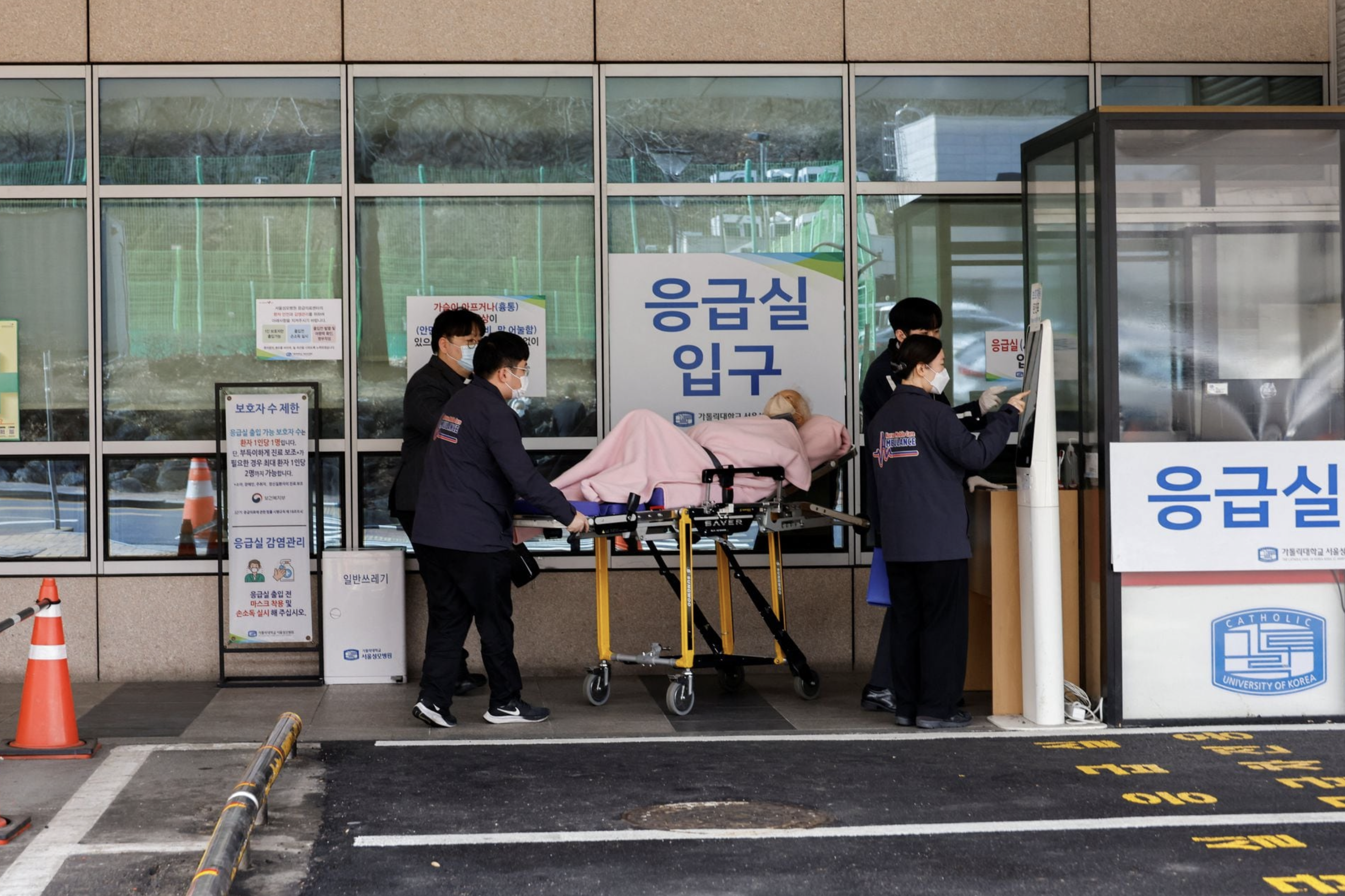 A patient is wheeled at The Catholic University of Korea, Seoul ST. Mary’s Hospital, ahead of the protests by doctors against the government's medical policy, in Seoul, South Korea, February 25, 2024. Photo: Reuters