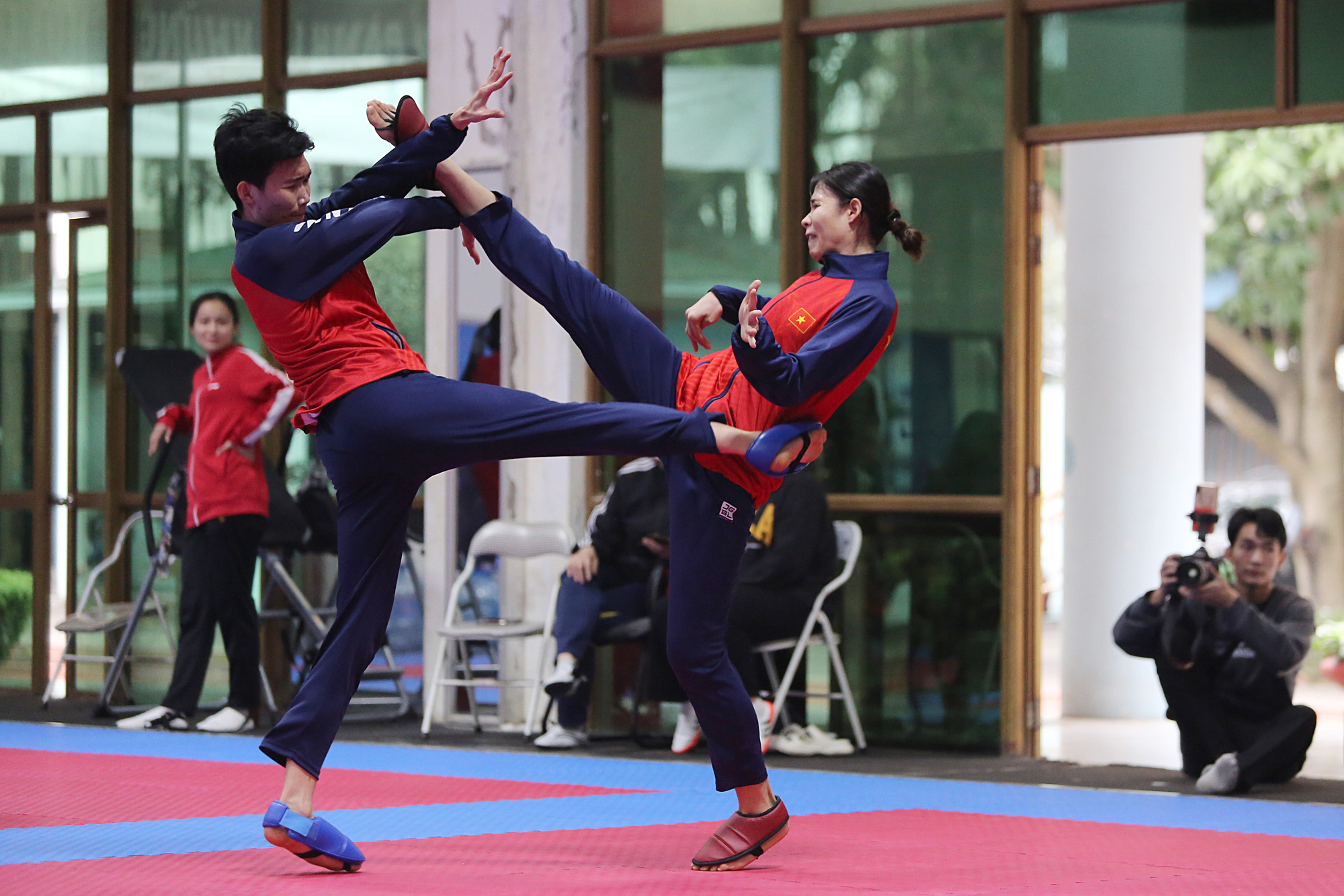 Athletes of Vietnam’s national taekwondo team layer up during indoor training, February 2024. Photo: Hoang Tung / Tuoi Tre
