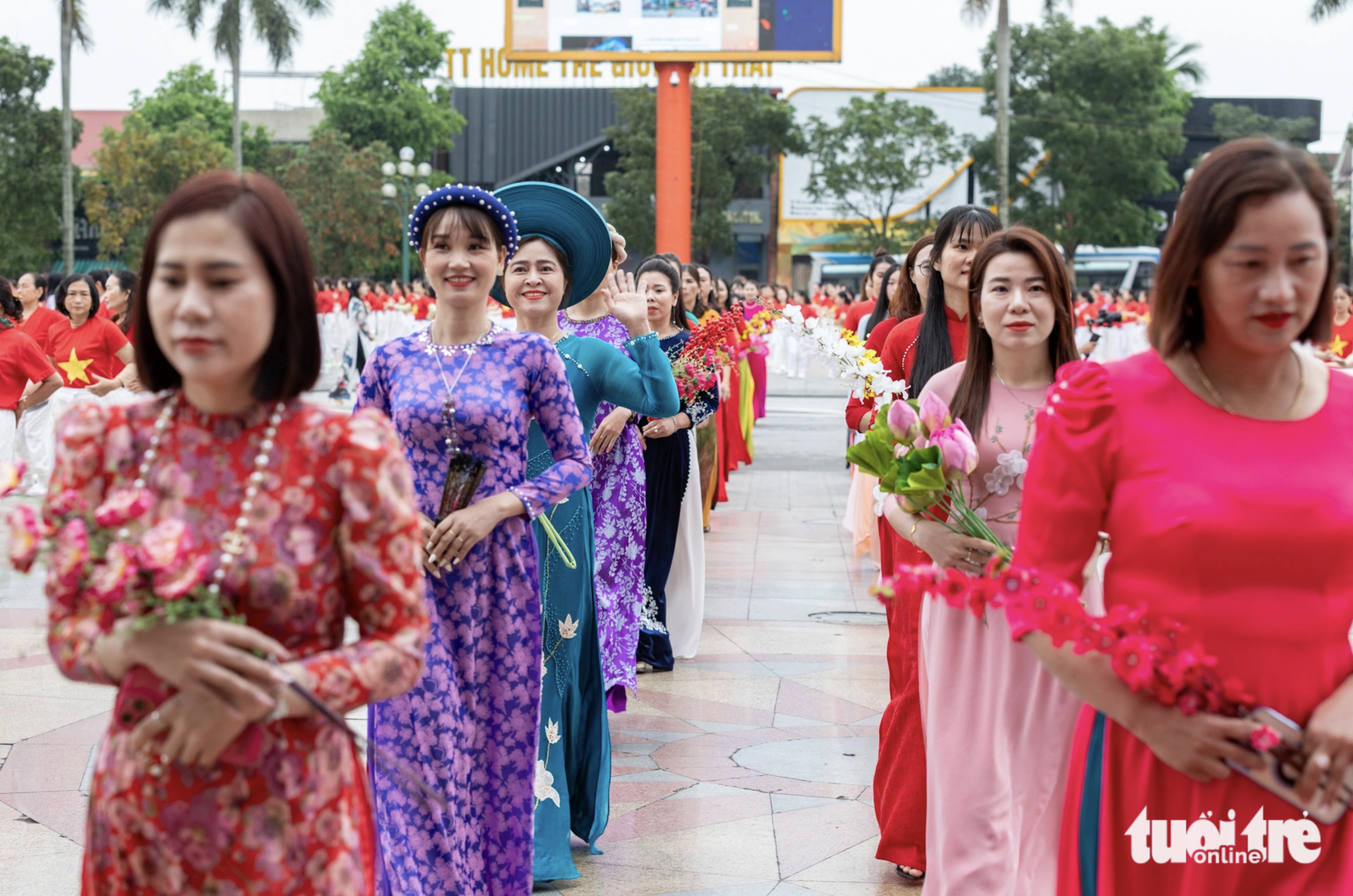 A dance ensemble and an ao dai performance in Dong Ha City, Quang Tri Province, north-central Vietnam were meant to celebrate the upcoming International Women’s Day (March 8). Photo: Hoang Tao / Tuoi Tre