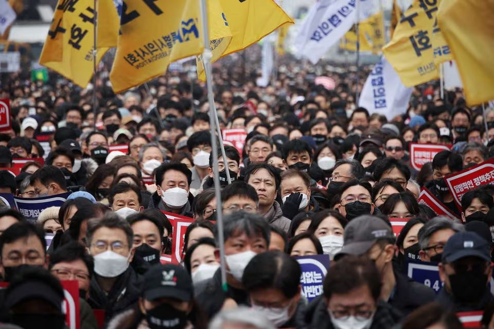 Doctors take part in a rally to protest against government plans to increase medical school admissions in Seoul, South Korea, March 3, 2024. Photo: Reuters