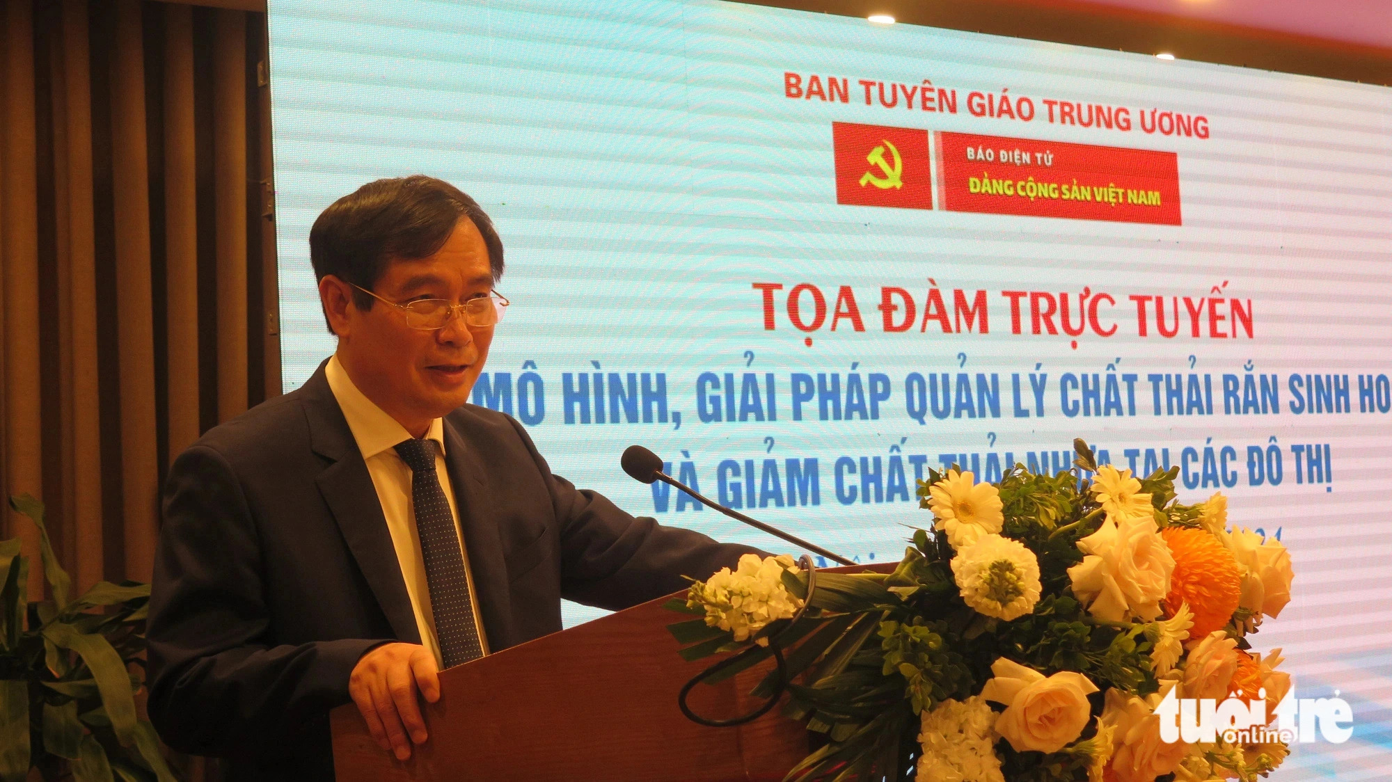 Phan Xuan Thuy, deputy head of the Commision for Propaganda and Training of the Communist Party Vietnam Central Committee, addresses an online conference on waste management and reduction in Hanoi, March 7, 2024. Photo: Quang The / Tuoi Tre