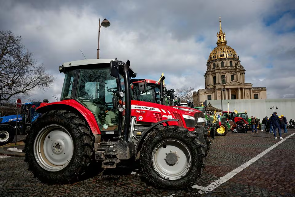 Tractors of the French farmers of the Coordination Rural (CR) are parked during a go-slow operation as they protest ahead of the opening of the Paris farm show, in Paris, France, February 23, 2024. Photo: Reuters