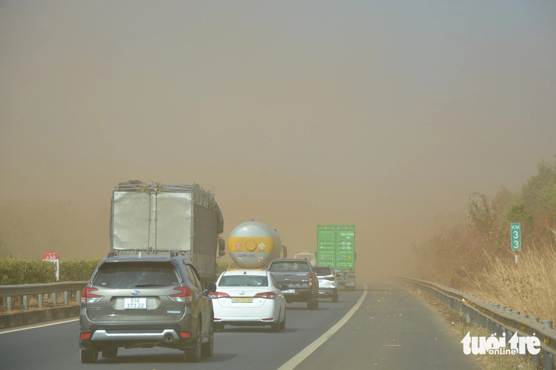Dust from construction site of Vietnam’s Long Thanh airport project blankets nearby expressway