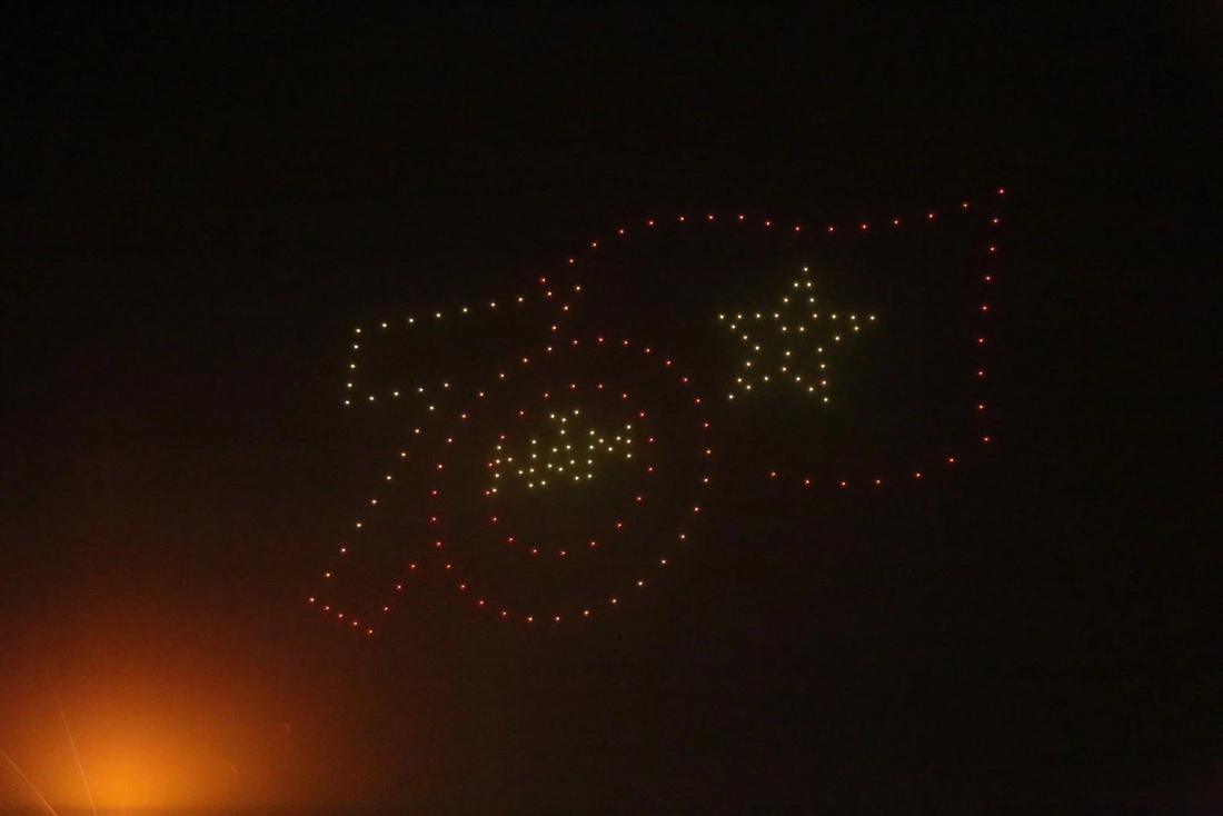 The logo featuring 70 years of the Dien Bien Phu victory is formed in the drone light show in Dien Bien Phu City, Dien Bien Province, northern Vietnam, March 16, 2024. Photo: Tien Dung / Tuoi Tre