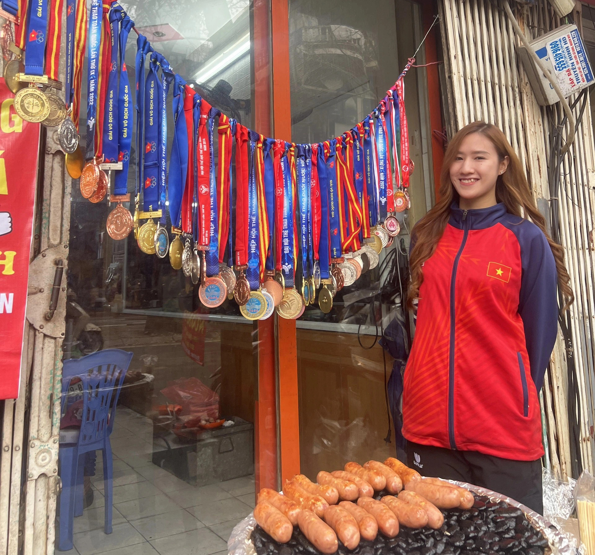 Vietnamese diver turns medals into marketing gold for sausage store