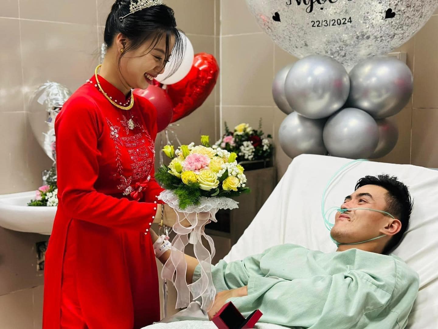 T.H. and N.A. look at each other during their hospital bedside wedding at Lang Son General Hospital in Lang Son Province, northern Vietnam, March 22, 2024. Photo: Supplied