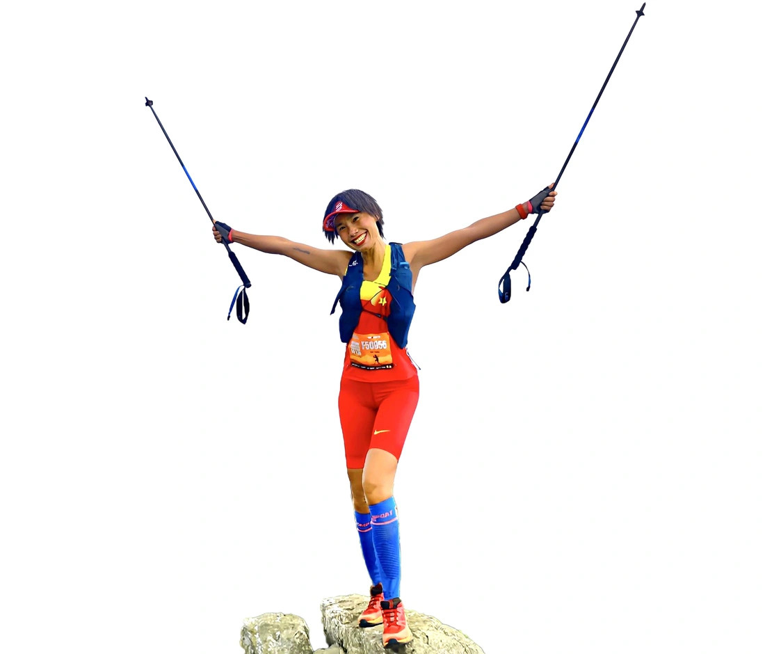 Nguyen Tieu Phuong poses on a rock with her hiking gear, 2023. Photo: NVCC