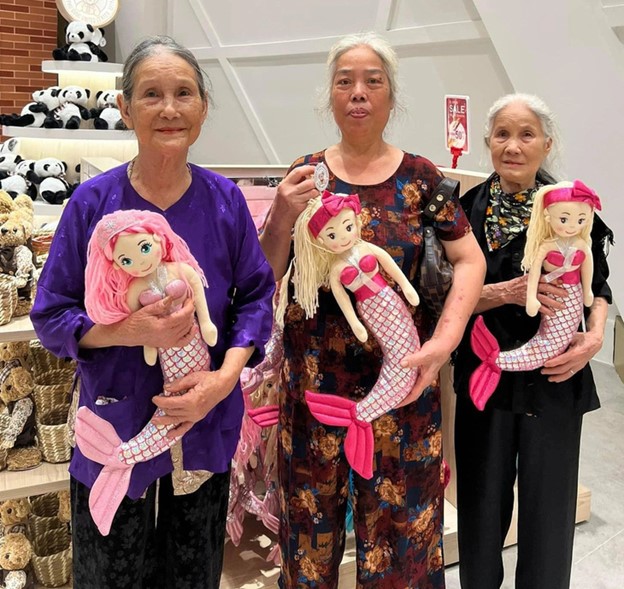 The three old women pose for photos in all destinations they reach. Photo: Supplied