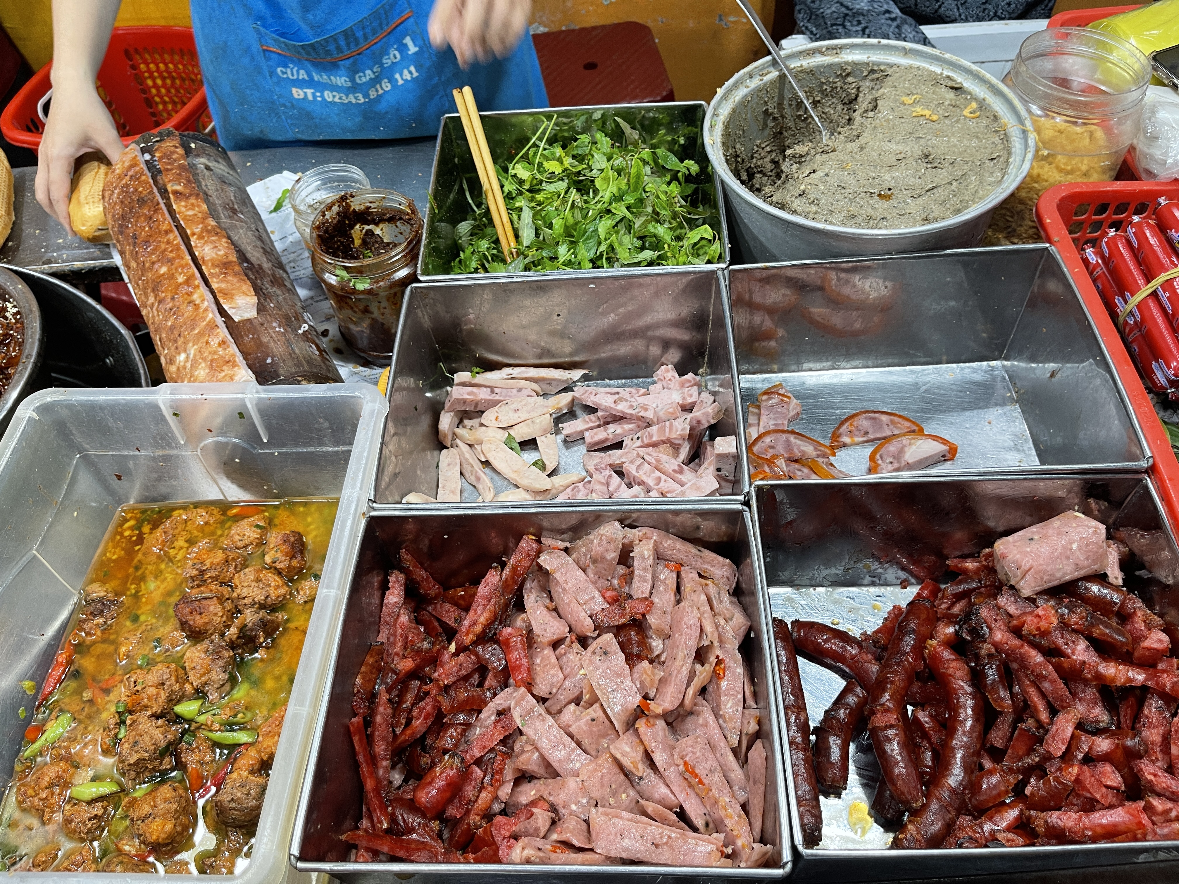 Fillings of ‘bánh mì’ are displayed at at Bánh Mì Trường Tiền O Tho shop in Hue City, Vietnam. Photo: Dong Nguyen / Tuoi Tre News
