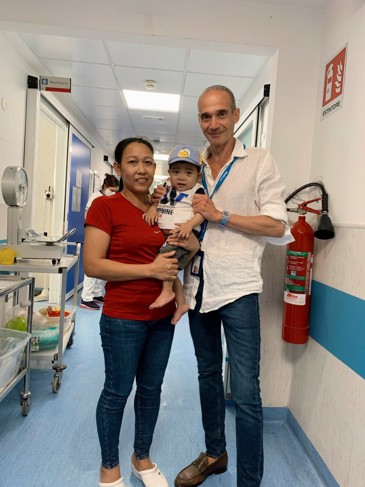 A medical staff member at Bambino Gesu Children’s Hospital poses for a photo with Nguyen Thi Ngoc Hang and her three-year-old son Nguyen Anh Loc during their time in Italy. Photo: Supplied